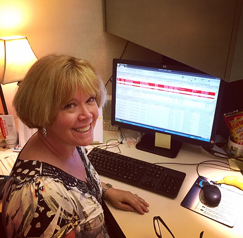 Julie working hard to get clients on the air. 