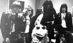 The Ramones and The San Diego Chicken backstage after a radio station KGB sponsored concert.   Other rock ‘n roll legends the famous mascot performed with on stage include Paul McCartney, Elvis Presley, Doobie Brothers, Sammy Hagar and more.