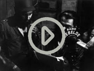 castro and Che_Radio Rebelde with play button