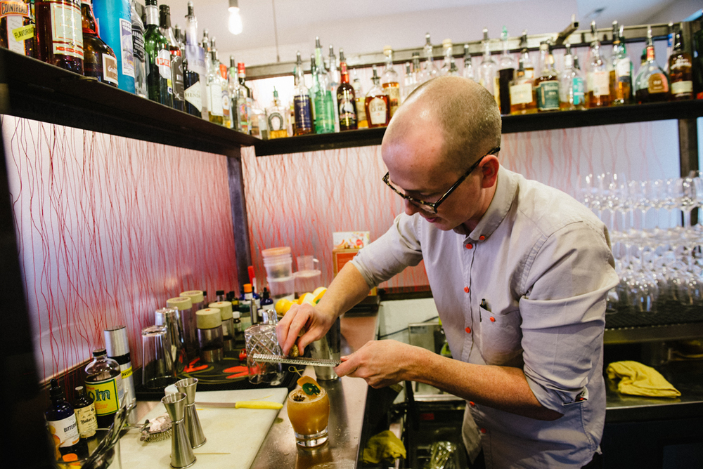 Scott Gardner, bar manager of Finca in Salt Lake City, Utah prepares craft cocktails behind the Zion Curtain.